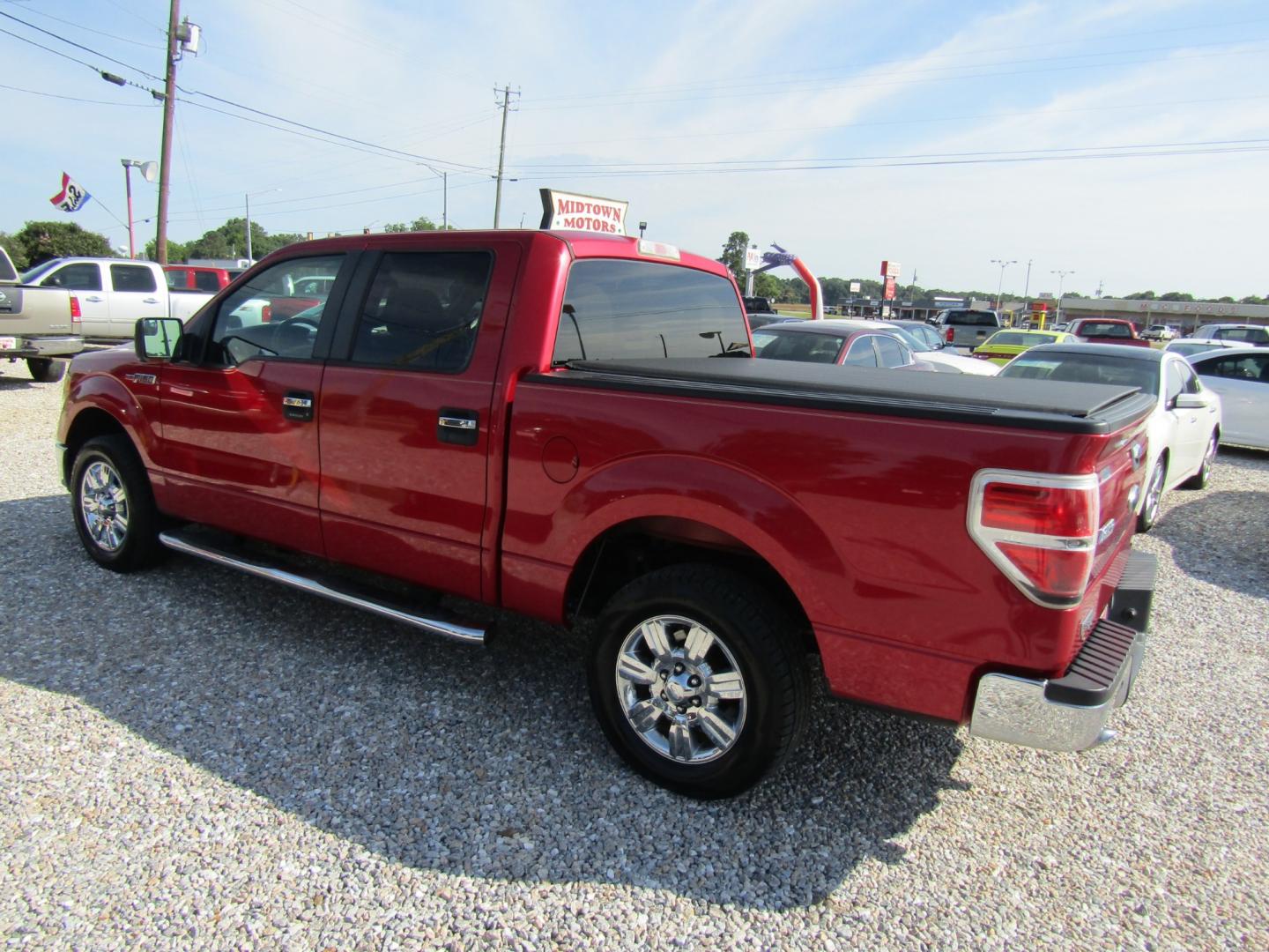 2011 Red /Tan Ford F-150 FX2 SuperCrew 5.5-ft. Bed 2WD (1FTFW1CF2BF) with an 5.0L V8 engine, Automatic transmission, located at 15016 S Hwy 231, Midland City, AL, 36350, (334) 983-3001, 31.306210, -85.495277 - Photo#5